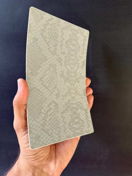 54 - Ivory Embossed Serpent